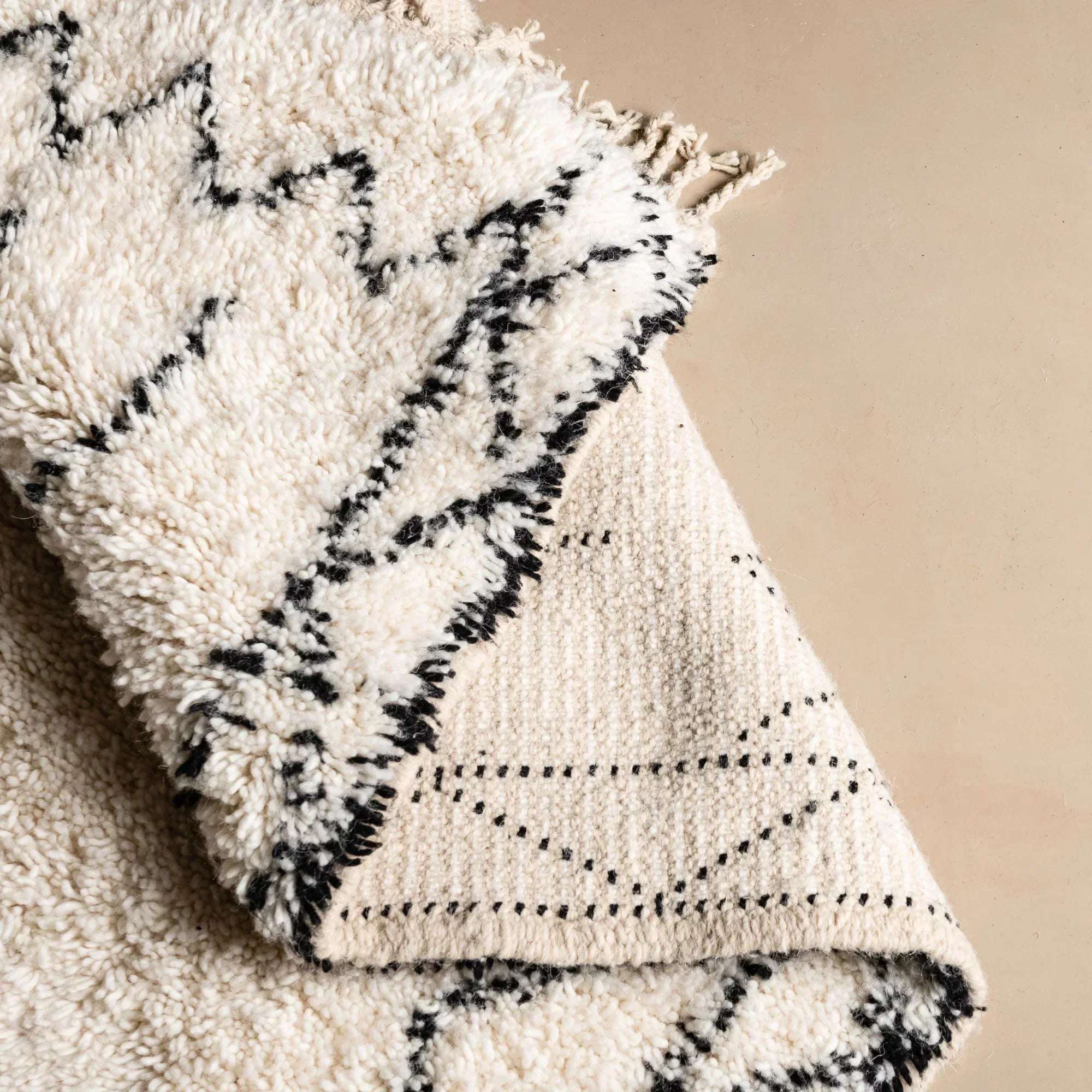 Elevate your decor with our exquisite Contemporary Moroccan Handmade Rug. Crafted with care, our Beni Ourain Area Rug blends tradition with modern elegance. Discover timeless beauty for your home today!